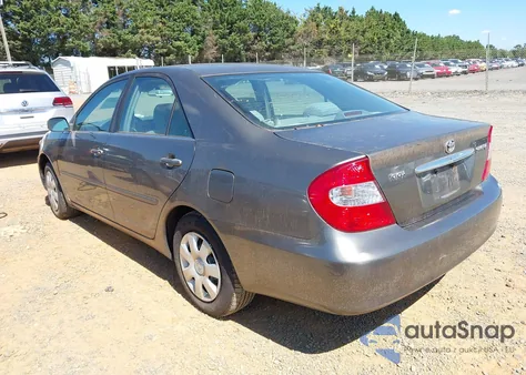 2002 Toyota Camry Le from USA, damaged, VIN 4T1BE32K12U589738